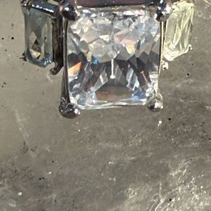 Radiant Silver and Clear Gemstone Ring